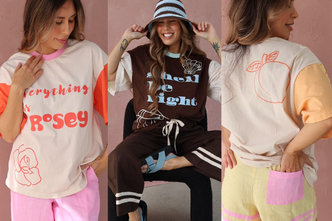 Three women wearing different outfits with colorful designs on a pink background
